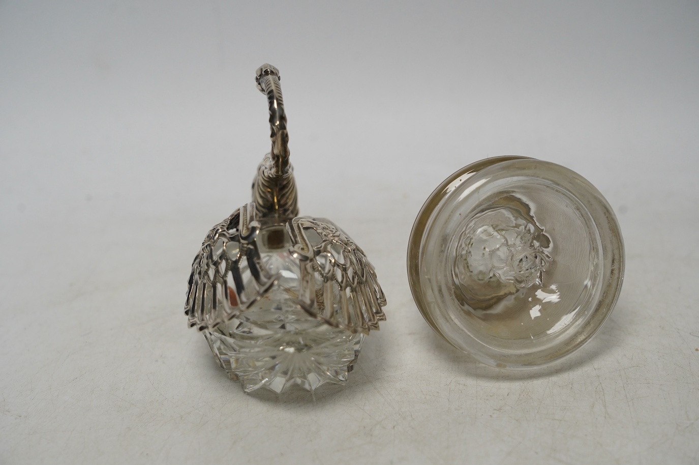 A white metal mounted glass match strike and a silver mounted swan bon bon dish, 10cm. Condition - poor to fair